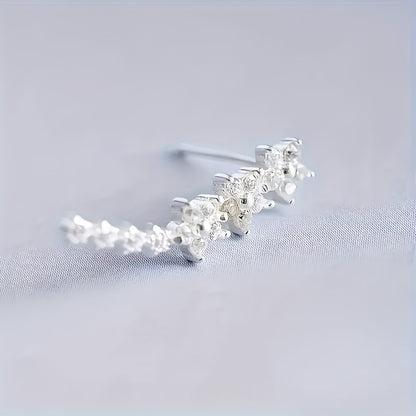 Delicado conjunto de pendientes florales